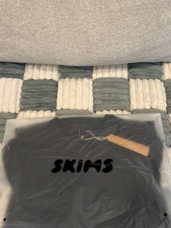 SKIMS Tops - SKIMS Black Branded Garment Cover with Tag